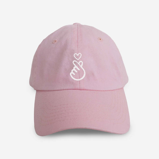 Light pink kids hat with embroidered finger heart – Asian-inspired design