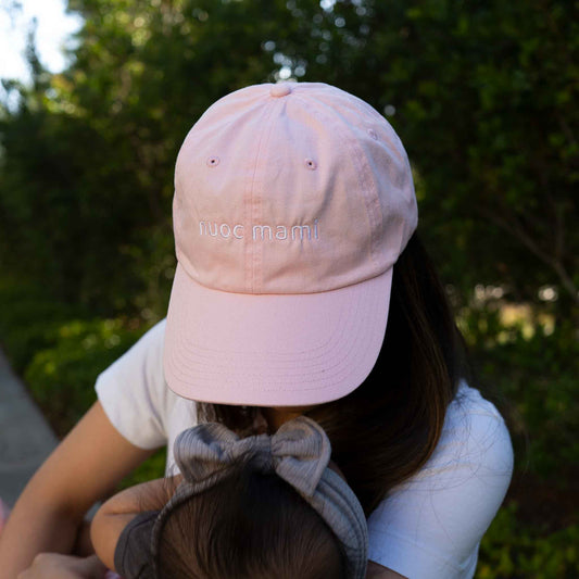 Asian American mom wearing Nuoc Mami hat